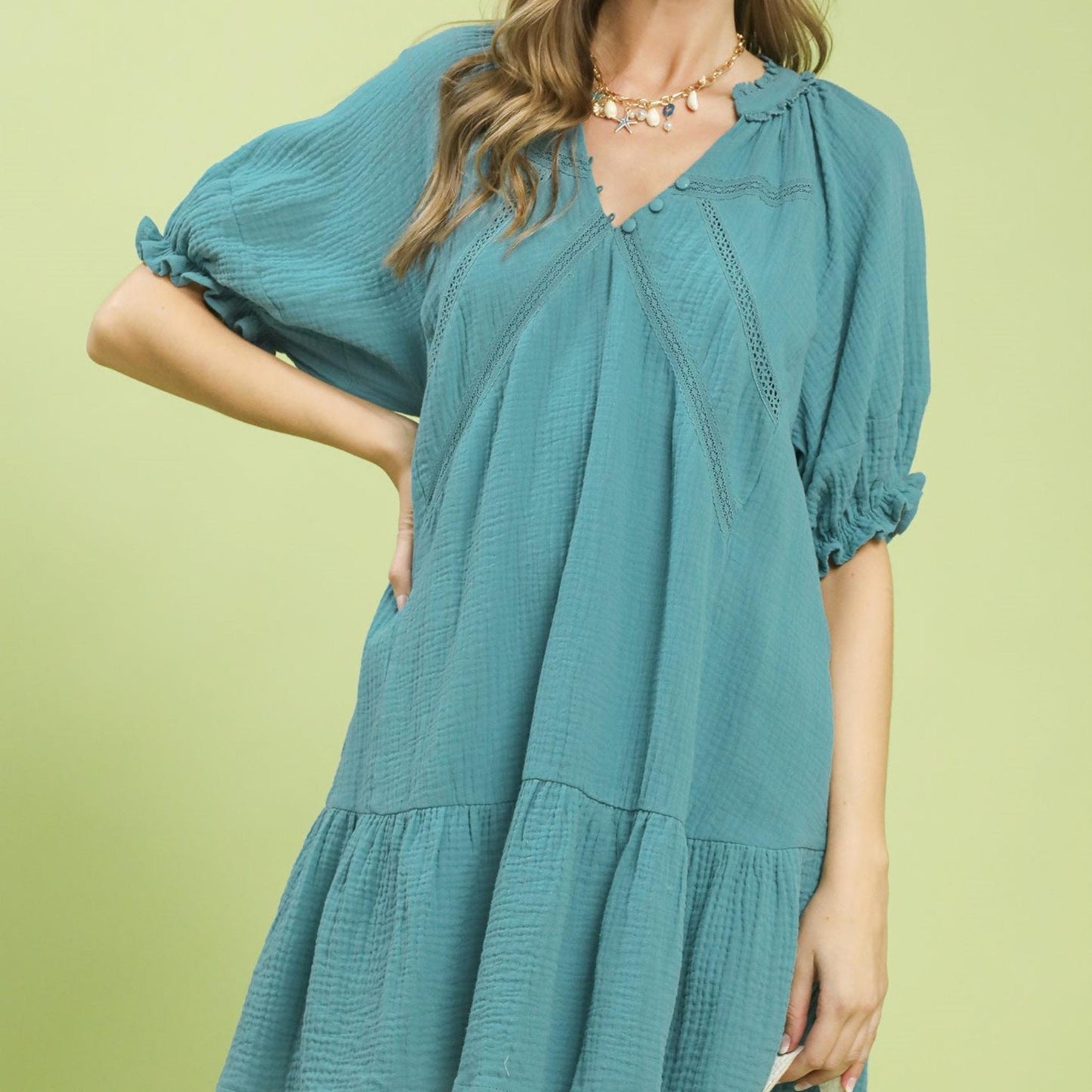 Front view of the Umgee blue cotton gauze mini dress with flowy ruffle sleeves.