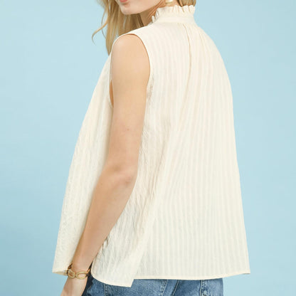 Back view of the textured sleeveless top highlighting the breathable rayon-nylon blend.