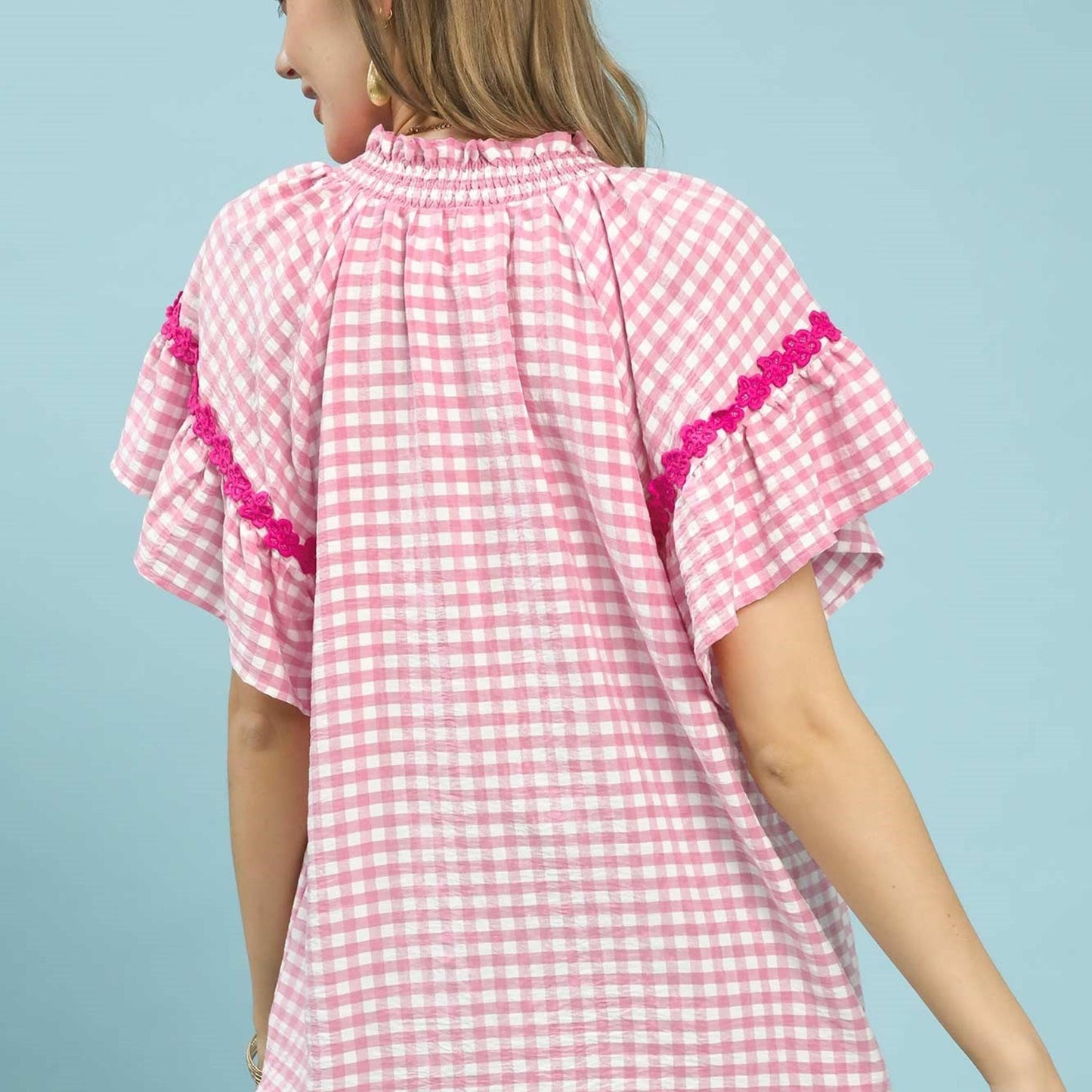 Back view of the Umgee pink gingham top showing the structured, feminine fit.