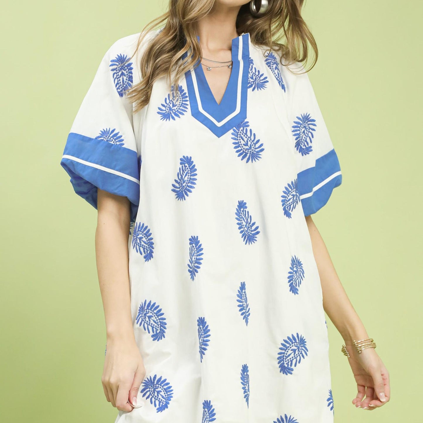 Front view of the Umgee paisley embroidered boho mini dress in off white.