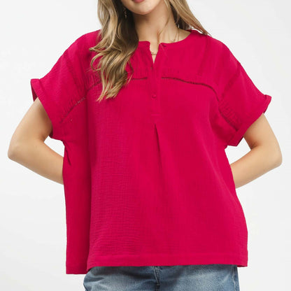 Front view of the Umgee red textured gauze split-neck boho blouse.