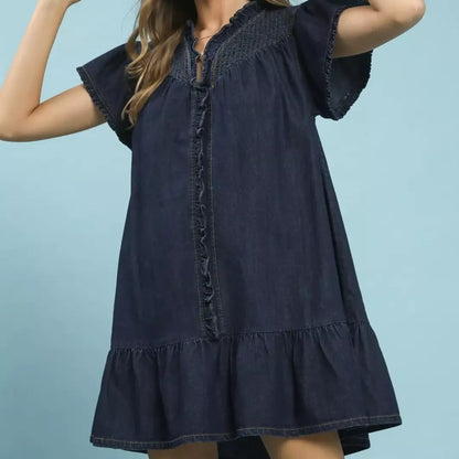 Umgee ruffled washed denim dress in faded blue with a relaxed silhouette and ruffle details
