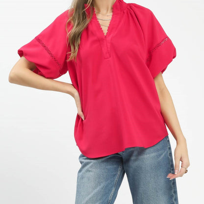 Front view of the Umgee teaberry pink lace trim peasant top.