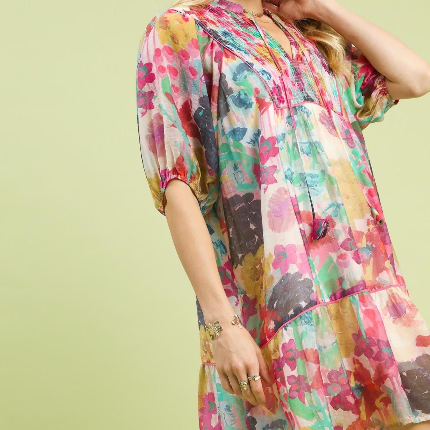 Side profile highlighting the tiered hem and flowy movement of the babydoll silhouette.