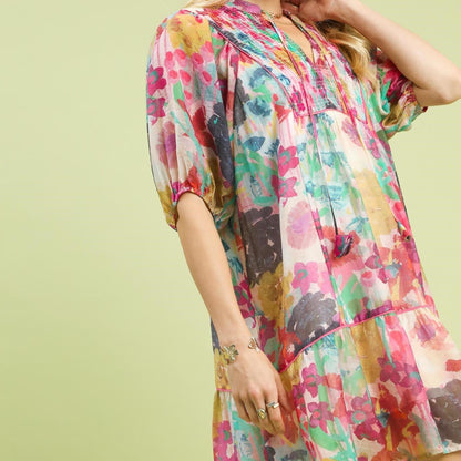 Side profile highlighting the tiered hem and flowy movement of the babydoll silhouette.