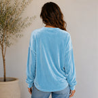 Back view of the women's sky blue Velvet Henley Sweatshirt featuring a relaxed silhouette and ultra-soft brushed velvet fabric.