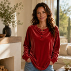Women's red Velvet Henley Sweatshirt featuring a Henley button neckline, soft velvet fabric, long sleeves, and a relaxed everyday fit.