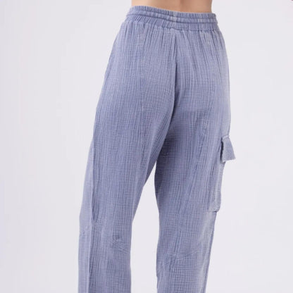 Very J denim blue crinkle gauze cargo pants — back view.