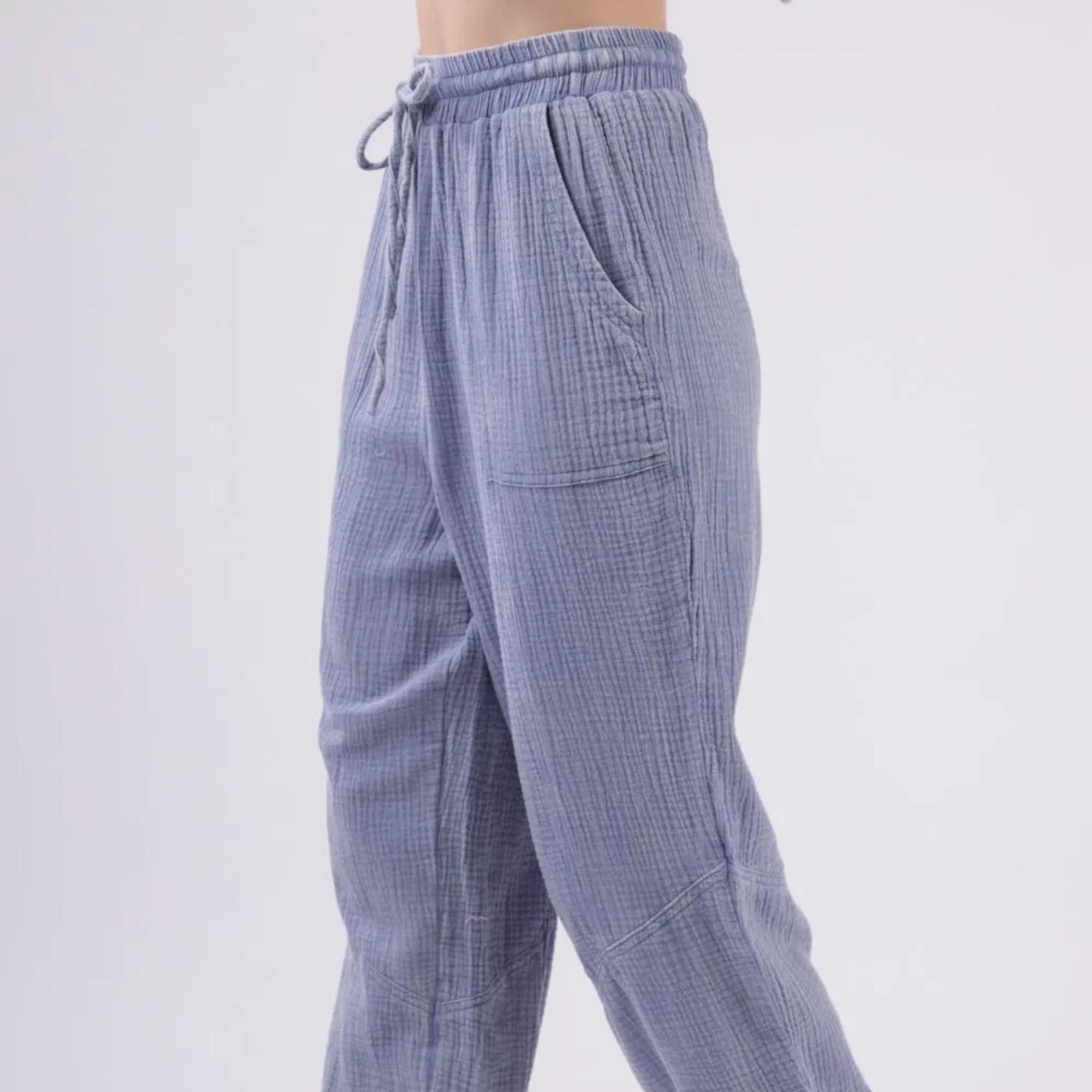 Very J denim blue washed crinkle gauze drawstring cargo pants — lifestyle view.