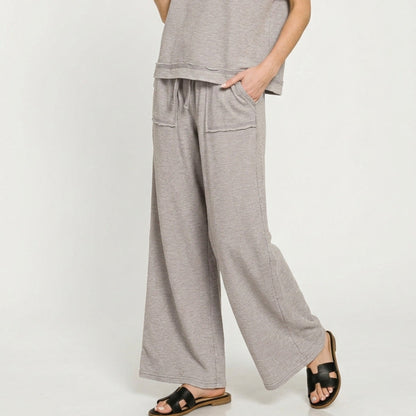Front view of the muted sleet grey two-piece set showing the relaxed fit and slub texture.