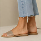 Side view of Wild Diva Rhinestone Open-Toe Flat Sandals in rose gold featuring sparkling rhinestones and flat slip-on design.