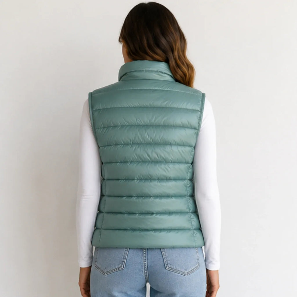 Back view of women’s bean green oversized puffer vest jacket