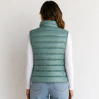 Back view of women’s bean green oversized puffer vest jacket