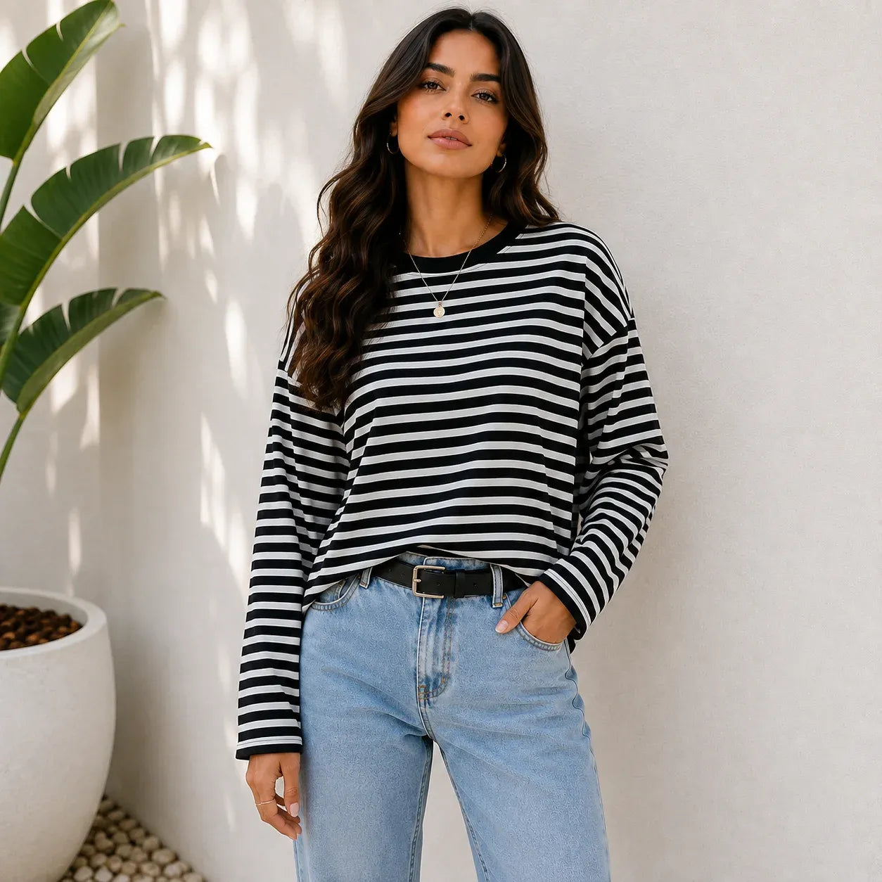 Women's black striped loose-fit long-sleeve crew neck top