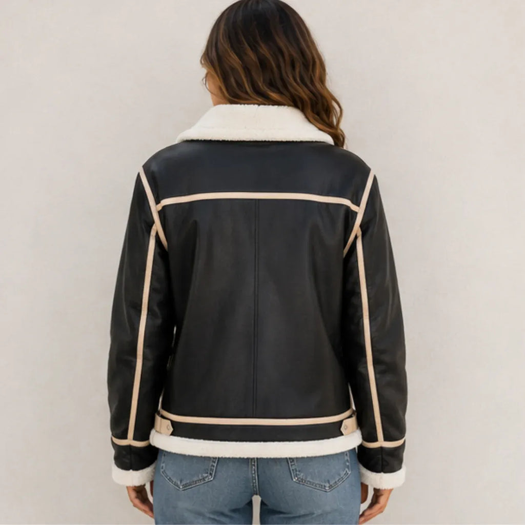 Back view of women's black faux shearling-lined leather jacket with cream contrast trim