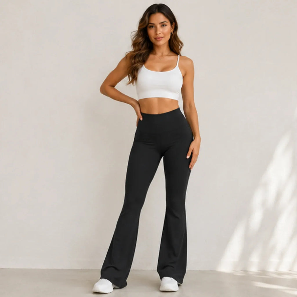 Women's high-waisted flared yoga pants in black with wide-leg silhouette