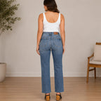 Women's Judy Blue tummy control straight jeans in medium wash denim shown from the back featuring a flattering fit, classic pockets, and straight-leg design.