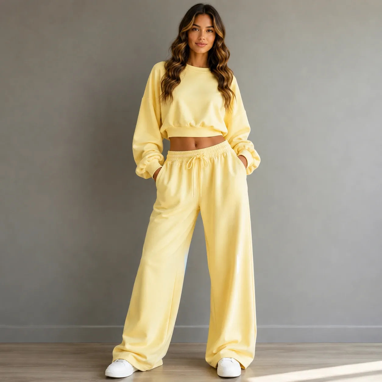 Women’s light yellow crop sweatshirt and wide-leg pants set