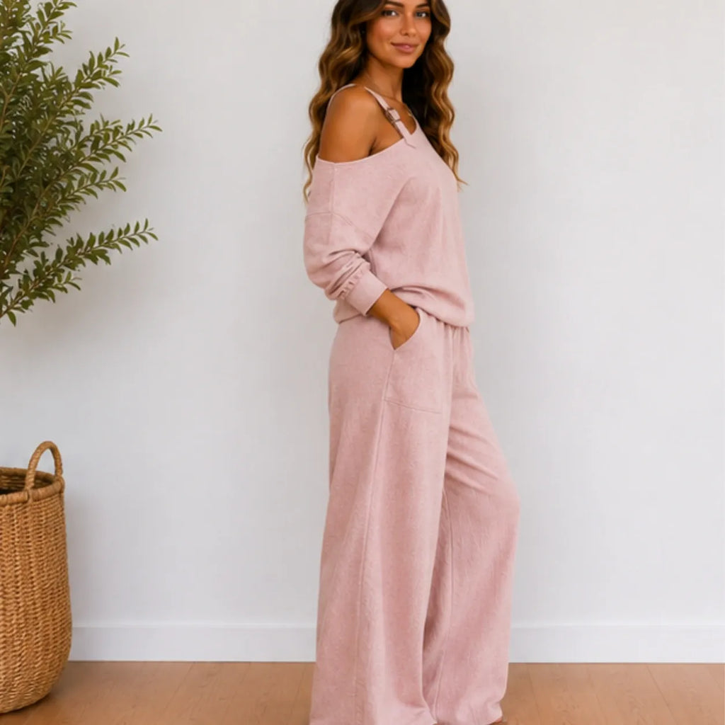 Side view of women’s pink linen-blend two-piece set with shoulder strap and wide-leg pants