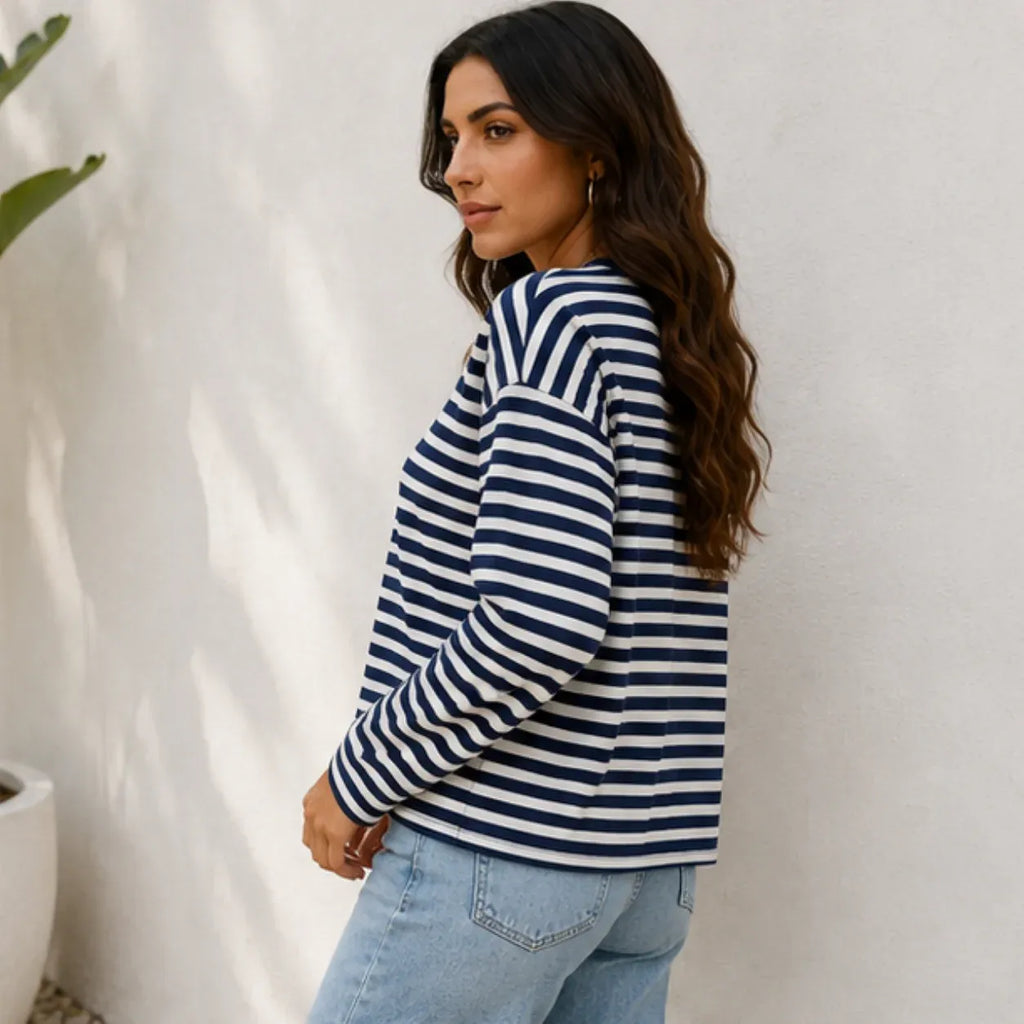 Women's navy striped loose-fit long-sleeve crew neck top side view