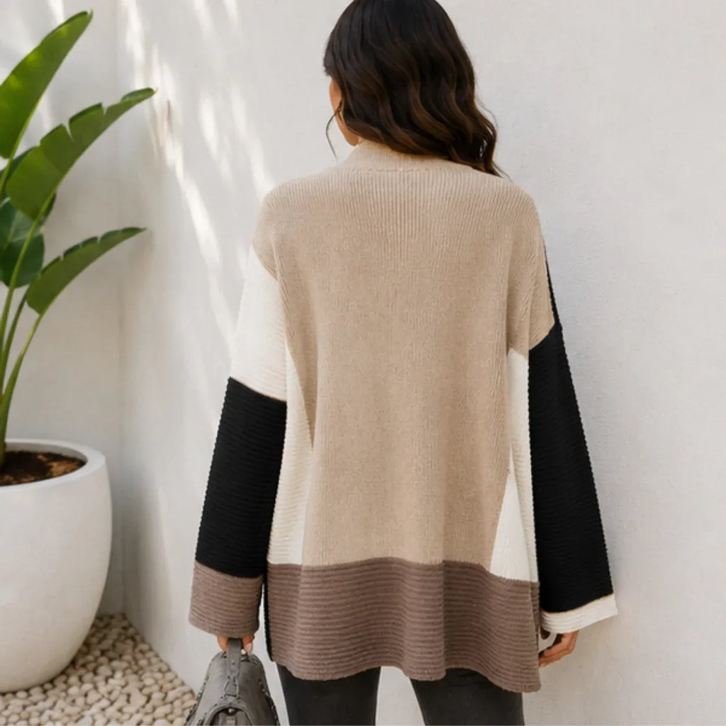 Women's oversized color block cardigan in black, cream, and taupe, back view