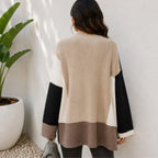 Women's oversized color block cardigan in black, cream, and taupe, back view