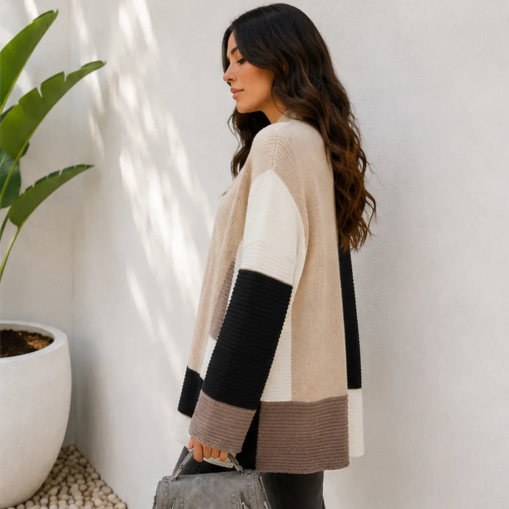 Women's oversized color block cardigan in black, cream, and taupe, side view
