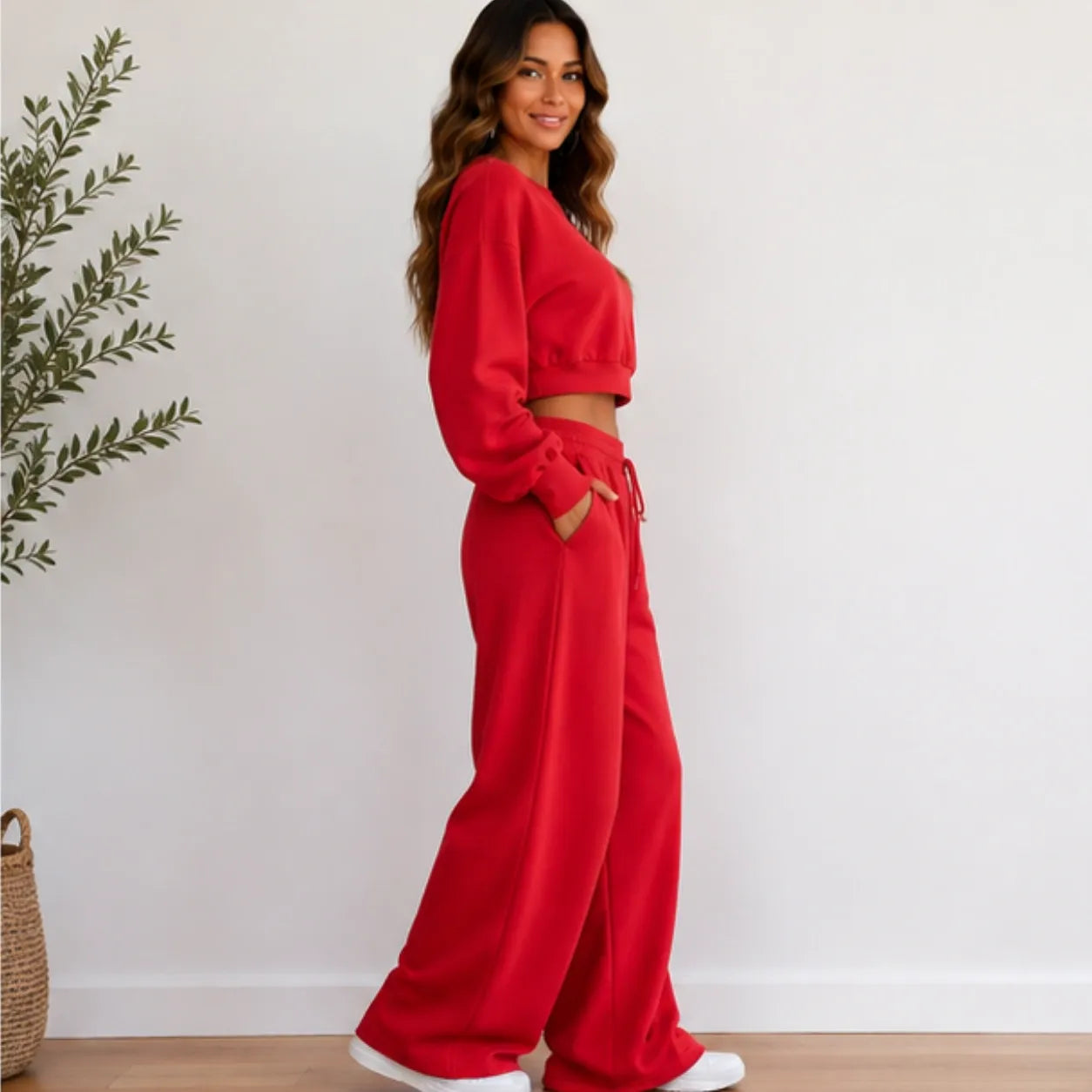 Women’s red crop sweatshirt and wide-leg pants set side view