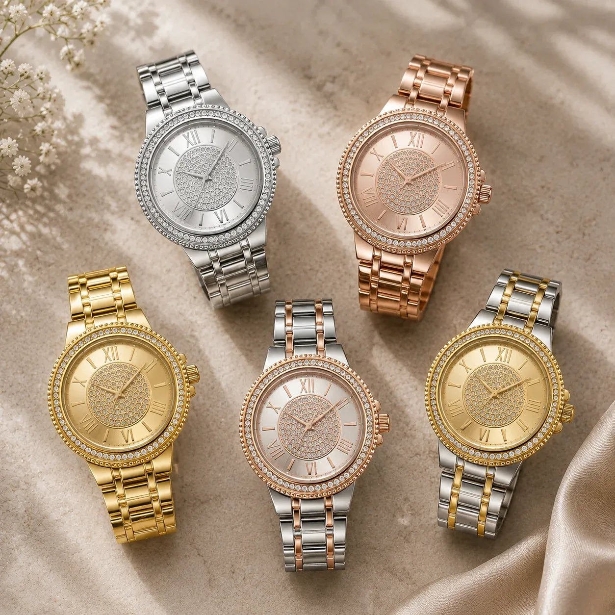 Women's rhinestone Roman numeral bracelet watch shown in five color finishes