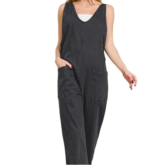 Front view of Zenana Black Casual Adjustable Strap Baggy Jumpsuit with pockets.