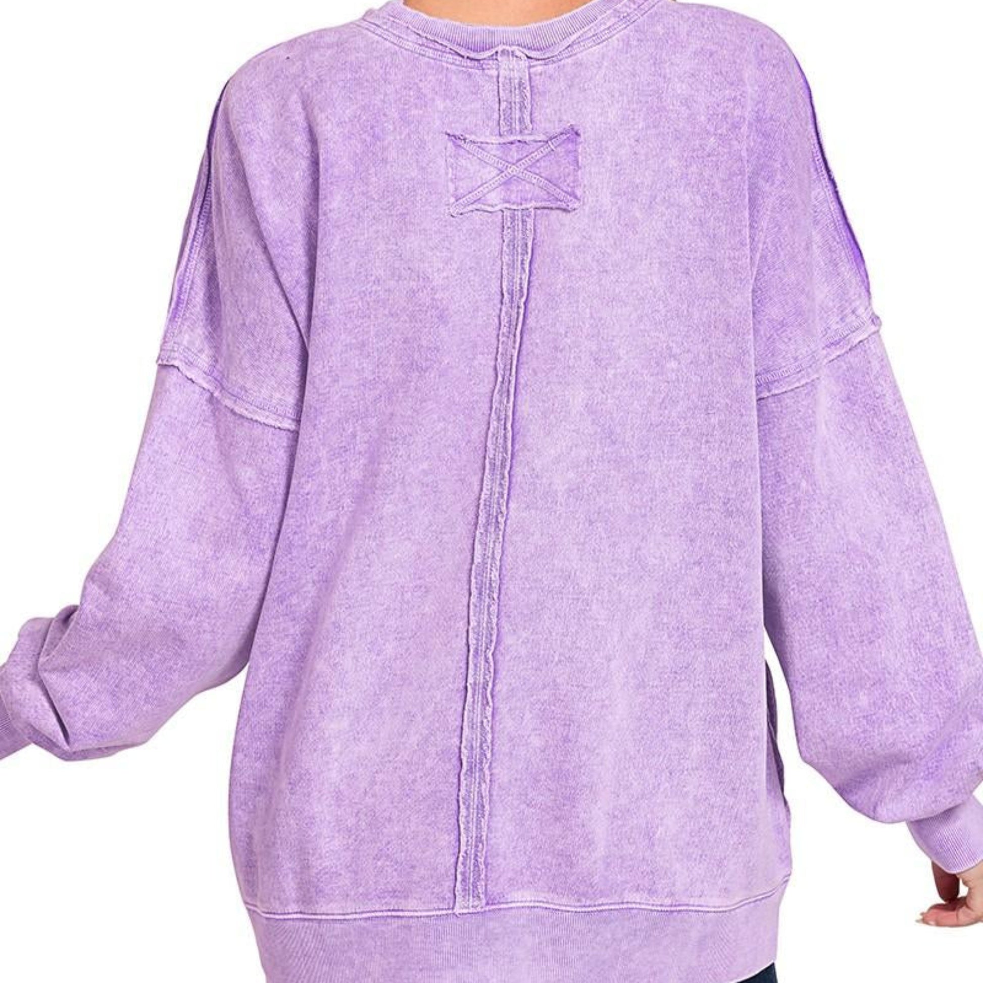 Back view of Zenana halo washed French terry exposed seam sweatshirt violet oversized boutique pullover