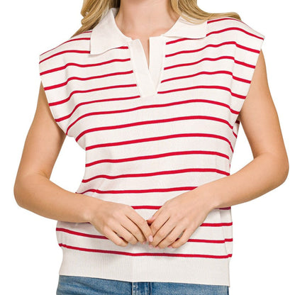 Model wearing the Zenana striped ruby and ivory sweater vest during a coastal morning reset.