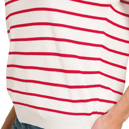 A realistic everyday outfit featuring the ruby striped knit vest layered over a white long-sleeve tee.